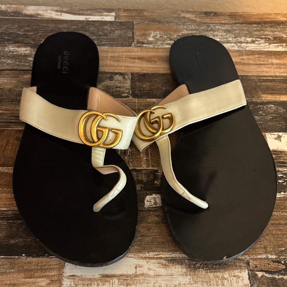 Gucci Women's Black and White Sandals with Gold Accents